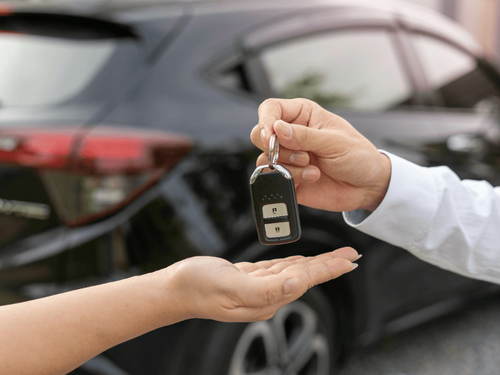 husband giving his car keys to his wife