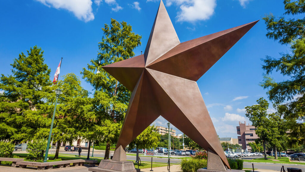 large star monument outside on a sunny day