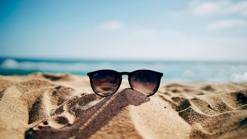sunglasses on a beach