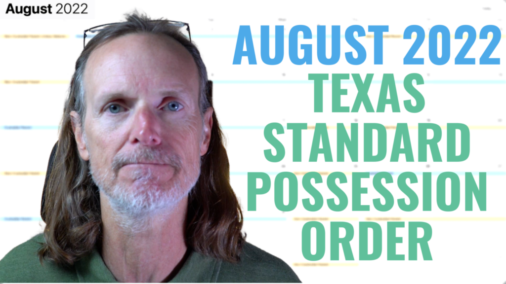 man standing in front of a August calendar