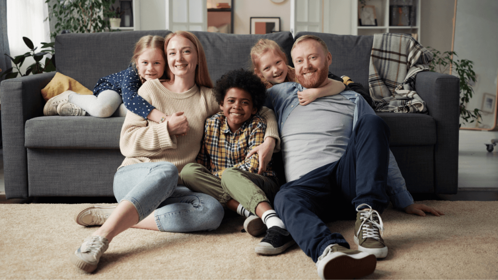 A husband and wife with their children