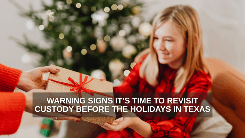 A smiling teenage girl in a red plaid outfit receives a wrapped Christmas gift from an adult in front of a decorated holiday tree, representing family connection and holiday custody moments in Texas.